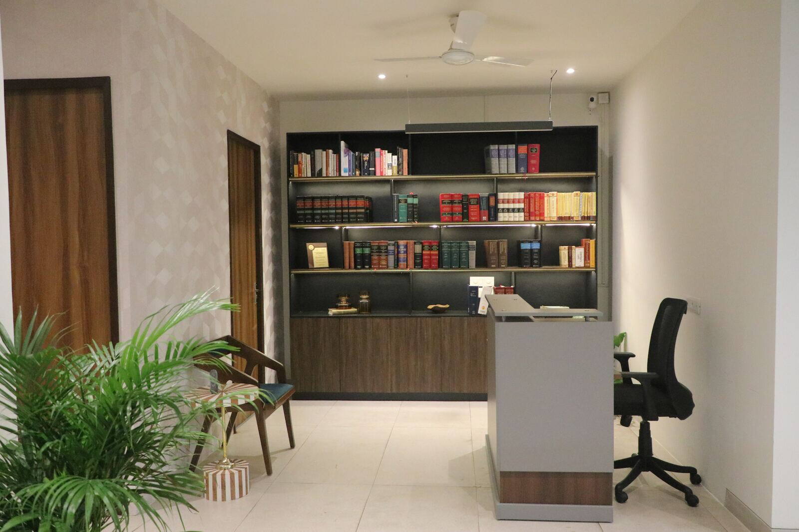 Project Gulmohar reception with law library shelving